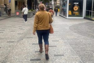 woman walking through the city